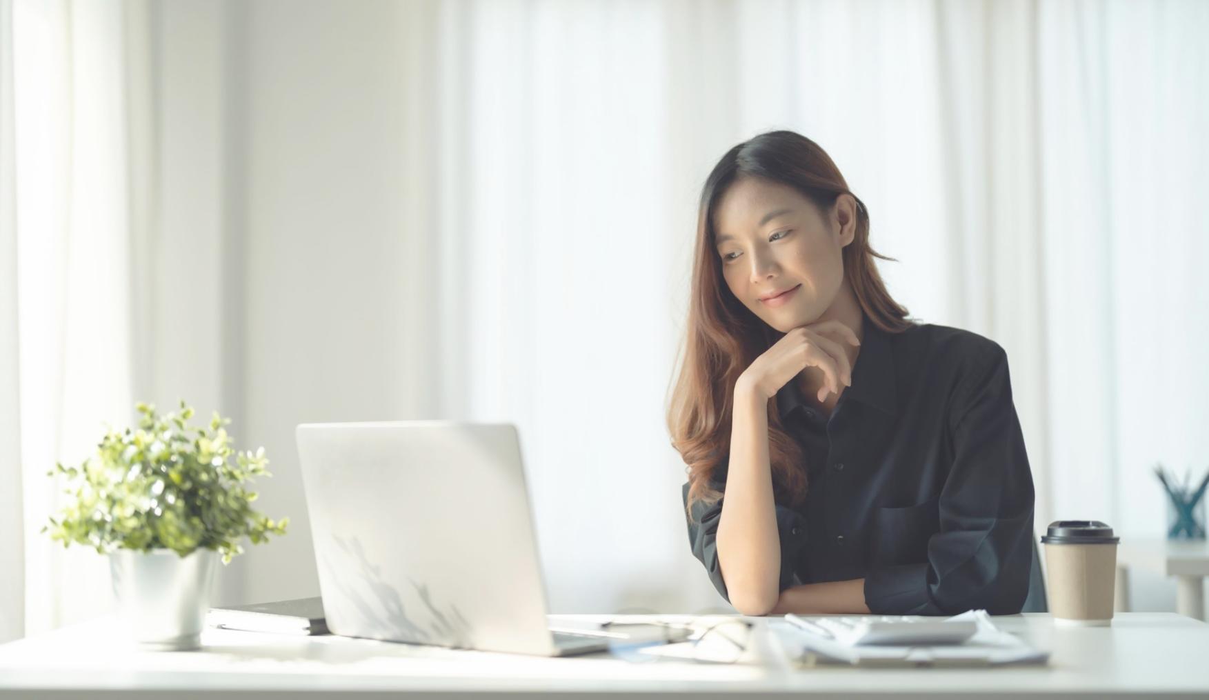 Financial advisor reviewing investment strategies with client documentation